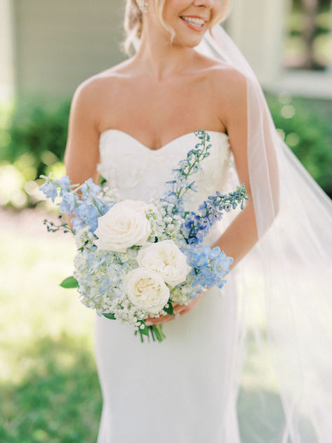 Blue and white wedding flowers bridal bouquet Dusty Blue Flowers Bouquet Bridesmaid, Pale Blue Wedding Bouquet, Something Blue Wedding Flowers, Timeless Bride Bouquet, Flowers For A Blue Wedding, Powder Blue Bouquet, Blue Delphinium Wedding Bouquet, Spring Wedding Flower Centerpieces, Flowers For Light Blue Dress