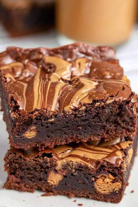 Rich and dreamy peanut butter brownies - need I say more? They're impossibly indulgent and deliciously luxurious. One bite will satisfy all your cravings. Peanut Butter Brownies Recipe Homemade, Best Peanut Butter Brownies, Chocolate And Peanut Butter Brownies, Brownie Recipes Peanut Butter, Peanut Butter Icing For Brownies, Peanut Butter Brownie Bars, Peanut Butter Swirl Brownies Box Recipes, Chocolate Peanut Butter Brownies Easy, Healthy Peanut Butter Brownies