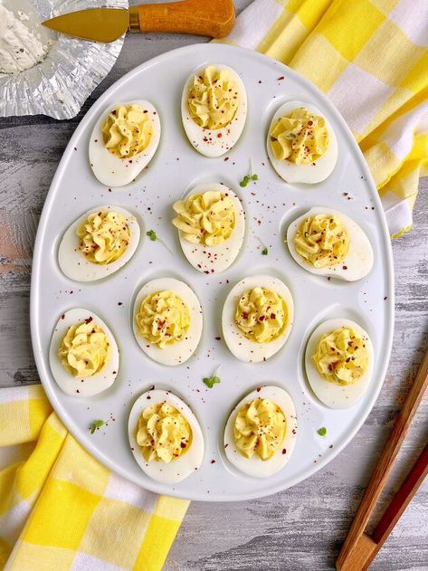 Today, we’re making Boursin Deviled Eggs! I can’t believe that this time last year, I’d never had Boursin cheese before. But here we are, a few life changing months later, and now I add Boursin cheese to basically everything…including today’s recipe!This recipe was born as a result of mixing leftover Boursin cheese scraps into my scrambled eggs. And of course, it was epic. So I got to thinking, this egg/cheese combo is obviously delicious. Why not give it a go as a cool, portable dev… German Sauerkraut Recipe, Avocado Deviled Eggs, Perfect Hard Boiled Eggs, Best Deviled Eggs, Bacon Deviled Eggs, Sauerkraut Recipes, Boursin Cheese, Egg Cheese, Herb Cheese