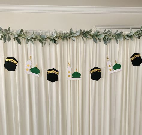 This banner is made with high quality cardstocks.  This banner measures up to  4ft 8in approximately with 4kaaba pennants and 3madina pennants.  This will be a good ad on for Eid decorations, Hajj Mubarak decorations etc. Please also check other products from this shop https://houseofzaam.etsy.com Umrah Mubarak Decorations Ideas, Ramzan Mubarak Decoration, Banner Maulidur Rasul, Rabi Ul Awal Decoration Ideas, Milad Decoration Ideas At Home, Maulid Decoration, Hajj Decorations Ideas, Ramadan Classroom Decorations, Eid Home Decoration Ideas