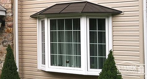 White three-lite bay window with colonial grids and shingled hip roof. Learn more. Bay Window Ideas Outside View, Bay Window Outside View, Bay Windows Ideas, Bay Window Trim, Small Bay Window, Bay Window Exterior, Stairs House, Window Images, Bay Window Design