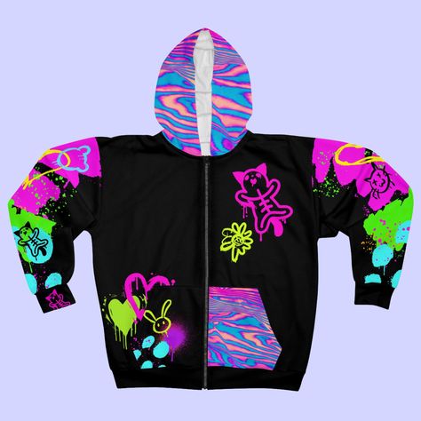 Who says you can't be adorable and a little rebellious at the same time? This "Cute Idiot" graffiti hoodie from Toki Toki embraces your inner contradiction with its unique design that's equal parts sweet and sassy. ⚡️ Splashed with vibrant colors and edgy street art vibes, it's the perfect canvas for your emo-scene style. Don't be fooled by its playful exterior - this hoodie packs a punch of attitude that'll turn heads wherever you go. Whether you're rocking out at a concert or just chilling wit Cute Emo Clothes, Scene Hoodie, Neon Clothes, Menhera Kei, Decora Style, Graffiti Clothing, Graffiti Hoodie, Harajuku Decora, Scene Style