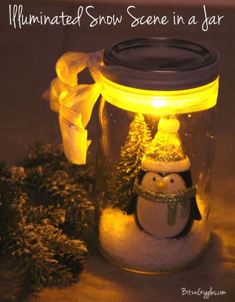 Illuminated by a battery-operated tea light.{BitznGiggles.com} Mason Jar Christmas Crafts, Jars Snow, Diy Snow Globe, Wine Bottle Diy Crafts, Christmas Mason Jars, Christmas Jars, Snow Scenes, Jar Gifts, Mason Jar Diy