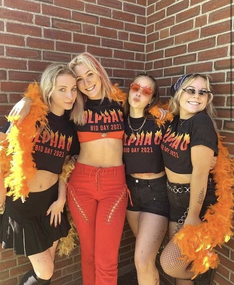 Four girls from Alpha Omicron Pi wearing fire themed outfits for bid day Coming In Hot Bid Day, Aoii Bid Day, Rush 2013, Sorority Themes, Recruitment Themes, Greek Week, Day Outfit Ideas, Bid Day Shirts, Girly Party