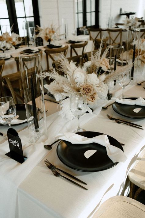 Unconventional Rehearsal Dinner, Black And White Wedding Theme Dresses, Goth Boho Wedding Decor, Black And White Modern Boho Wedding, Black And Beige Wedding Table, Black White Cream Wedding Decor, Black And Tan Table Setting, Backyard Wedding Black And White, Black Plates Table Setting Wedding Ideas