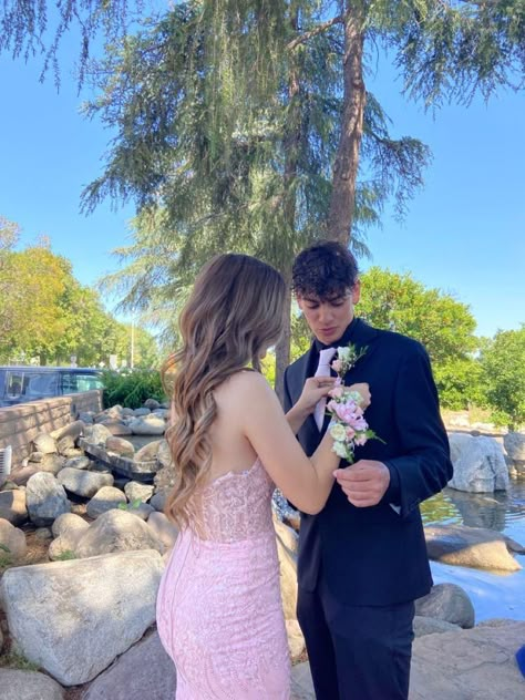 Light Pink Prom Couple Black, Pink Dress Matching Couple, Pink Hoco Dress With Date, Corsage With Pink Dress, Pink Prom Dress Couple Pictures, Pink Prom Looks For Guys, Blush Pink Prom Couple, Pink Matching Prom Couples, Navy Blue And Pink Prom Couple