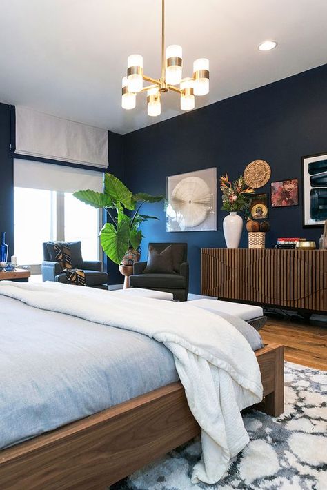 Get inspired by these navy blue bedroom ideas for your master decoration! #navyblue #navy #blue #bedroomdecoration #navybluebedrooms #bluebedrooms #navybedroomdecoration #masterdecoration #decoratingideas #bluerooms #navyrooms #navyblue #navybluedecoration Navy Bedroom Walls, Blue And Gold Bedroom, Dark Wood Bedroom, Dark Blue Bedrooms, Blue Bedroom Walls, Navy Blue Bedrooms, Bedroom Seating Area, Bedroom Seating, Gold Bedroom