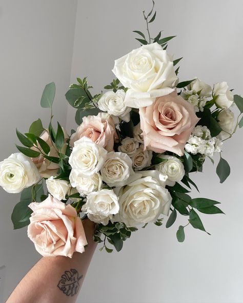 Heads up! We’ll be closed tomorrow for a wedding set-up at @lebelvedereweddings in Wakefield. We’ll be open regular hours on Saturday. In the meantime, enjoy this beautiful bouquet we designed for Alyssa. Quicksand, Playa Blanca roses, spray roses, white stock and ranunculus. Bridesmaids Holding One Flower, Peony And Rose Bouquet, Pink And White Bridal Bouquet, Quicksand Rose, Pink And White Bouquet, Blush Rose Bouquet, Internally Screaming, White And Pink Roses, Roses White