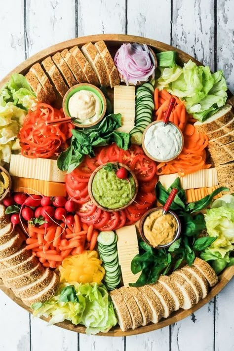 10 Tasty Food Boards To Try - Society19 Food Boards Vegetarian, Sandwich Toppings Tray, Veggie Grazing Board, Vegetarian Graze Board, Vegetarian Platter Ideas, Vegetarian Grazing Board, Vegetarian Party Food For A Crowd, Charcuterie Board Vegetarian, Best Veggie Sandwich