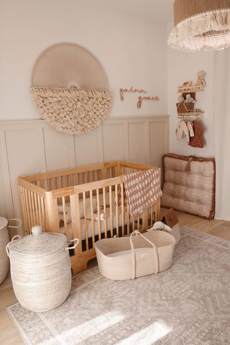 Beige Nursery Panelling, Neutral Rugs Nursery, Nursery Wall Board And Batten, Cute Boho Nursery, Beige Board And Batten Nursery, Nursery Tan Walls, Beige Neutral Nursery, Nuetral Girl Nursery Ideas, Tan Neutral Nursery