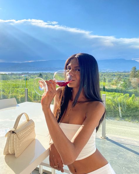 Natalie Prasad on IG wearing an all white outfit with a glass of red wine at a vineyard Vineyard Poses Instagram, Vinyard Wine Outfit, Winery Pics Ideas, Winery Photo Ideas Instagram, Winery Asethic, Vineyard Photo Ideas, Winery Picture Ideas Instagram, Wine Tasting Picture Ideas, Winery Poses Instagram