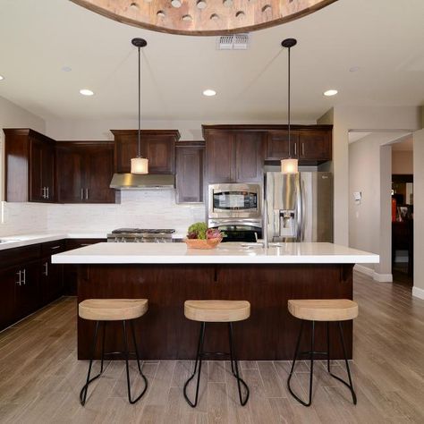 Eat-In Transitional Kitchen Has Dark Cabinets and Granite Countertops | HGTV Kitchen Cabinets Cherry Wood, Cherry Wood Kitchen, Wood Kitchen Decor, Cherry Wood Kitchen Cabinets, Cherry Wood Kitchens, White Kitchen Countertops, White Kitchen Appliances, Galley Kitchen Remodel, Cherry Kitchen