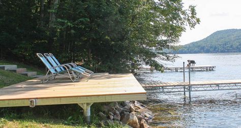 Shoreside platforms, deck areas & walkways Deck On Lake House, River Deck Design, Lake Front Deck Ideas, Deck By Lake, Cantilever Deck Over Water, Lakeshore Landscaping Ideas, Lake Docks Designs, Hillside Deck, Dock Ideas