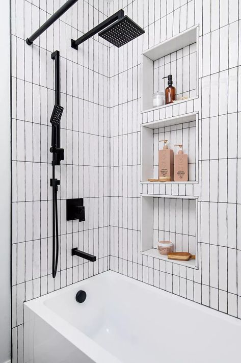 26 Bathtub Tile Ideas to Give Your Shower-Tub Combo a Custom Feel Tubs With Tiled Walls, Tiled Bathtub Shower Combo, Shower Tub Combo Niche Ideas, Large Tile Tub Surround, Modern Bathtub Shower Combo, Tub And Shower Remodel, Deep Bathtub Shower Combo, Bath And Shower Combo Ideas, Bathtub Niche Ideas