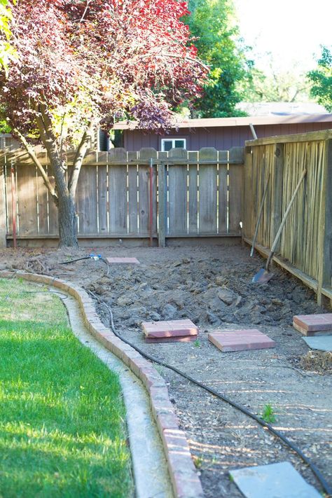 A before image of a backyard with grass and dirt patch Before And After Backyard Landscaping, Backyard Easement Landscaping Ideas, Budget Backyard Landscaping, Front Yard Oasis Ideas, Simple Yard Ideas Easy Diy, Backyard Remodel Before And After, Cover Dirt Backyard Ideas, Backyard Cleanup, Small Backyard Transformation