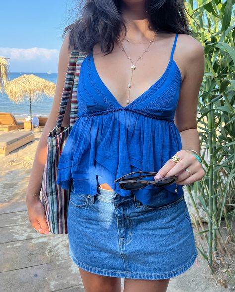 @evaastavrouu in our lexi blue ruffle babydoll cami top🧿🌊🍹🌸 Babydoll Top Outfit Aesthetic, Blue Ruffled Tops For Playwear, Blue Babydoll Top, Babydoll Cami Top, 2000 Babydoll Top, Blue Ruffled Tank Top, Ruffle Tops Outfit, Babydoll Cami, Blue Ruffle Top