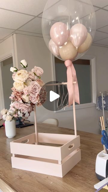 Louise Gough on Instagram: "I can’t even explain how much I loved making this 😂😂😂 

I could have kept going and adding things all day, But time we on whilst I was making this, but what do we think? 

Training members if we want a full video on this, I’ve another 5 to make 😂 let me know lol

#baby #babyshower #babyshowergift #babygift #newborn #newborngifts #balloons #babyshowerballoons #heliumballoons #personalisedballoons" How To Make Gift Hampers, Gift Basket With Balloons, Newborn Decoration Ideas, Diy Newborn Gifts, How To Make A Balloon Bouquet, Cute Ways To Wrap Baby Shower Gifts, Newborn Basket Gift, Baby Gift Wrapping Ideas, Baby Gift Box Ideas