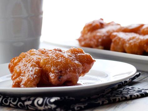 These unique fritters are like bread doughnuts, studded with pineapple and finished with pineapple glaze for just the right amount of sweetness. Koeksisters Recipe, Cabbage Fritters, Pineapple Fritters, Fritters Recipes, Corn Fritter, Sweet Corn Fritters, Pecan Snowball Cookies, Squash Fritters, Pineapple Glaze