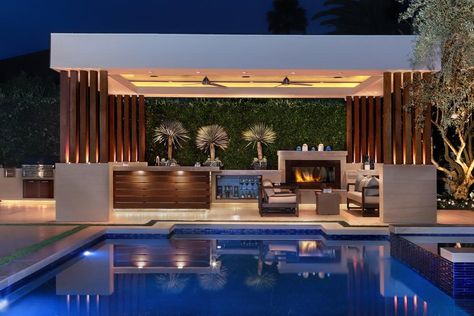 12 Gorgeous Outdoor Kitchens | HGTV's Decorating & Design Blog | HGTV Industrial Outdoor Kitchen, Cinema Rooms, Patio Seating Arrangement, Design Per Patio, Modern Pool House, Moderne Pools, Poolside Lounge, Pool House Designs, Modern Outdoor Kitchen