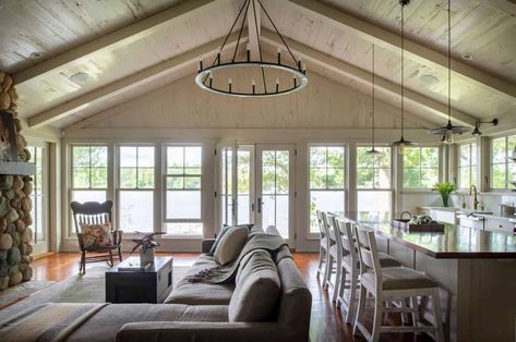 A cozy cottage with soothing interiors perched on a Minnesota lake Contemporary Lake House, Lakefront Cottage, Small Guest Rooms, Douglas Fir Flooring, Gull Lake, Minnesota Lake, Built In Dresser, Three Season Room, Storybook Cottage