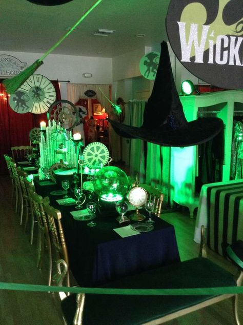 Wicked Party | CatchMyParty.com Wicked Halloween Decor, Emerald City Theme Party, Wicked Musical Themed Party, Wicked Musical Party Decorations, Wicked Musical Party Ideas, Wicked Movie Party, Wicked Musical Birthday Party, Wicked Party Decorations, Wicked Themed Birthday Party