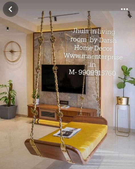 Ceiling Hanging Wooden Swing plank design. This is Plain swing with curved edges. This is traditional indian jhula for home living room.Contact 9909915760 for designs of indian Zula for home. This Wooden jhoola can be hanged in balcony also. We have a wide range of contemporary Swings for living room decor and also modern Swing for luxury homes. If you have a bungalow or Flat we have swing designs for all occasions. Our zulas are made from the best quality teak wood. We have pure brass chains... Wooden Swings In Balcony, Jhula In Balcony, Swing In Living Room, Balcony Swing, Living Room Indian, Indian Theme, Wooden Swing, Dressing Table Design, Swing Design