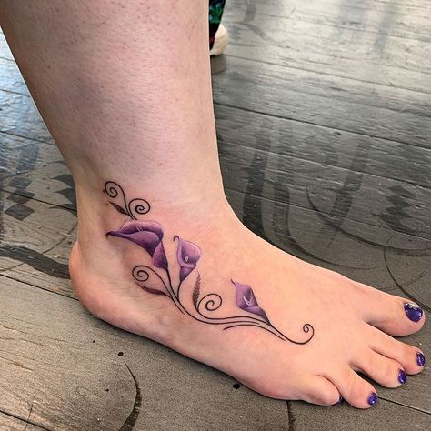 10 Best Calla Lily Tattoo Ideas You'll Have To See To Believe! | Outsons | Men's Fashion Tips And Style Guides Lily Tattoo Ideas, Calla Lily Tattoo, Lily Tattoo Meaning, Tiger Lily Tattoos, Heart With Infinity Tattoo, Water Lily Tattoos, Lillies Tattoo, Lily Tattoo Design, Lily Flower Tattoos