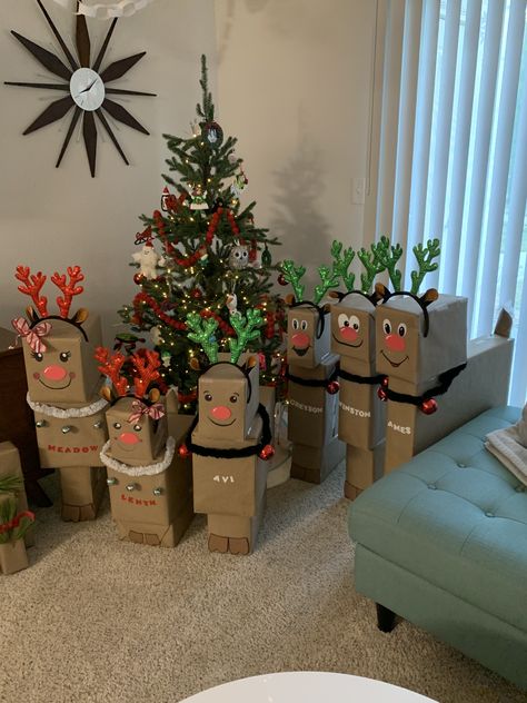 Loved making these Reindeer gift towers for my Grandchildren. Gave them little harnesses with bells on them. Even did little tails for them ❤️ Inspiration from lots of others here on Pinterest. Reindeer Tail Diy, Christmas Present Set Up, Reindeer Wrapped Presents, Reindeer Package Wrapping Ideas, Christmas Gift Towers For Kids, Reindeer Present Tower, Gifts From Santa For Kids, Reindeer Gift Wrapping Ideas, Reindeers Christmas Decorations