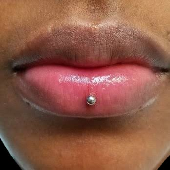 Nose Piercing Two On One Side, Lip Piercings Black Women, Bottom Lip Piercing Middle, Cheek Piercing Upper, Ashley Lip Piercing, Cute Facial Piercings, Types Of Body Piercings, Ashley Piercing, Different Ear Piercings