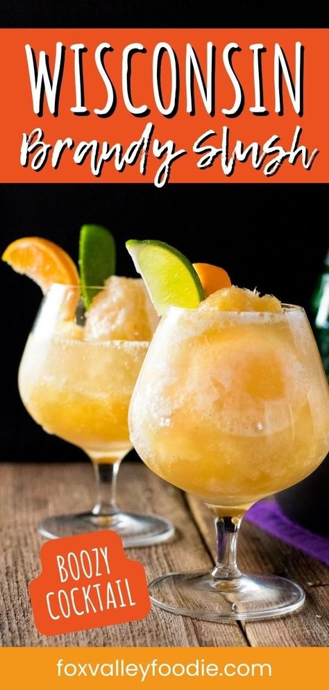 The Wisconsin Brandy Slush is a midwest classic featuring an icy mix of fruit juice, tea, and brandy. The Wisconsin Brandy Slush is a lesser-known classic Wisconsin cocktail that is perfect to enjoy on a hot summer day, at parties, and throughout the holiday season. This boozy punch is perfect to serve at your next get together. Thanksgiving Slush Drink, Wisconsin Appetizers, Peach Brandy Slush, Whisky Slush Recipe, Brandy Punch Recipe, Brandy Old Fashioned Slush Recipe, Old Fashioned Slush Recipe, Frozen Brandy Old Fashion Slush, Brandy Slush Recipe Without Tea