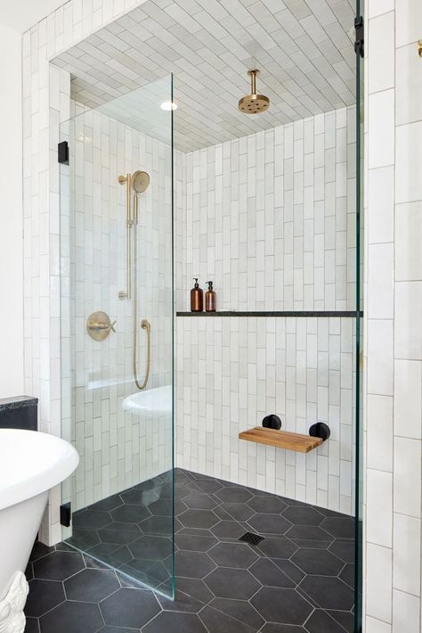 15 Stunning Black Tile Bathroom Floor Ideas - Nikki's Plate White Walls Black Floor Bathroom, White Subway Bathroom Tile Ideas, White Shower Tile With Black Accent, Black Floor White Tile Bathroom, Black Floor White Shower Bathroom, Shower Black Floor White Walls, Bathroom With White Tile Walls, Black And White Bathroom Ideas With Tub, Shower Tile Black Hardware