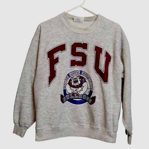 Ready for game day or cozy nights in? Check out our selection of vintage college sweatshirts and sweaters! From the Fresno State Bulldogs to the Oregon University, we've got you covered. Don't miss out on these unique finds! #college #football #vintage #sweatshirts #cozy 🏈🧡👕  #eBay #eBayStore #eBaySeller #Cardigan #fresnostate #oregonstate #ducks #etsy #reseller #vintageclothers #vintageseller #hazelthepirate
hazelthepirate.com Barbie Party Supplies, Fresno State Bulldogs, Vintage Madame Alexander Dolls, Fresno State, College Shirts, Nike Pullover, The Pirate, Vintage Sweatshirt, Vintage Barbie