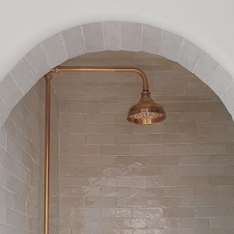 Riad Tile on Instagram: "Our 2x6 Natural White Zellige is finally back in stock!!!⁠
Love the arch and @wtrwrks fixtures with our 2x6 Natural White Zellige tile. Great work @enchantedberkeley. ⁠ Make sure to read her story below of this bathroom and how it came to be. ⁠
⁠
Repost from @enchantedberkeley⁠
Trusting your gut: one of the biggest things I’ve learned in design. With this shower, I was told not to do an arch, that the zellige was too thick and too difficult. I was told to put marble tile around the outside edge of the arch, and every step I had to push back and say “this is how I want it. please do it this way,” which is incredibly scary for someone doing this for the first time. It helped to do my research and know that all of these things in my head could be done. But half the ti Shower With Zellige Tile, Arch Shower Entry, Natural White Zellige Tile, Zellige Powder Bath, Zellige Tile Edge, Tiled Archway, Tiled Arch, Zellige Tile Bathtub Surround, Zellige Tile Powder Bathroom