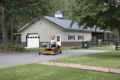 This horse barn/garage was built for Harold & Jennie of Reddick, FL  Special Features:    Morton's Hi-Rib Steel  Cupolas  Porch  Double Dutch Door... Pole Barn Designs, Pole Barn Garage, Equestrian Building, Riding Arena, Morton Building, Horse Barn Designs, Horse Barn Plans, Brick Siding, Pole Barns