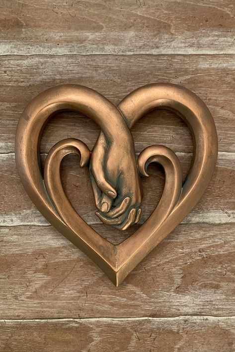 Show your love and decorate your favorite wall with this beautifully detailed bronze wall art (Heart Holding Hands plaque) from Top Brass Home Decor. Features a beautiful copper bronze verdigris finish. Made from hard / durable poly-resin material with amazing details. Metal hanger on back for easy, secure mounting. Bronze Wall Art, Brass Wall Art, Wood Sculpture Art, Advanced Woodworking Plans, Room Wall Painting, Bronze Wall, Metal Hanger, Soyut Sanat Tabloları, Art Heart