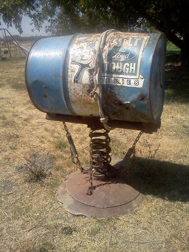 The Hammons' bucking barrel. Practice for steer or bull riding. Wishlist. Bull Riding Practice Barrel, Diy Mechanical Bull, Diy Bucking Barrel, Bucking Barrel, Pbr Bull Riding, Roping Dummy, Bucking Bulls, Tire Planters, Rodeo Time