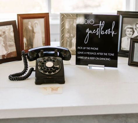 Vintage phone that records audio messages surrounded by photos of the couples' family members' wedding photos. Phone At Wedding, Phone Message Wedding, Vintage Phone At Wedding, Wedding Record Guest Book, Telephone Wedding Guest Book, Audio Guest Book Wedding, Voice Recording Wedding Guest Book, Audio Phone Guest Book, Audio Guest Book Vintage