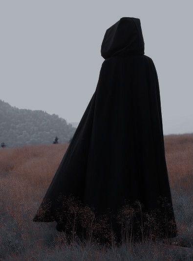 Mysterious Cloaked Character, Hooded Cloak Aesthetic, Fantasy Cloak Aesthetic, Bardcore Medieval Aesthetic, Cloaked Figure Aesthetic, Headless Aesthetic, Black Cloak Aesthetic, Curse Witchcraft, Cloak Aesthetic