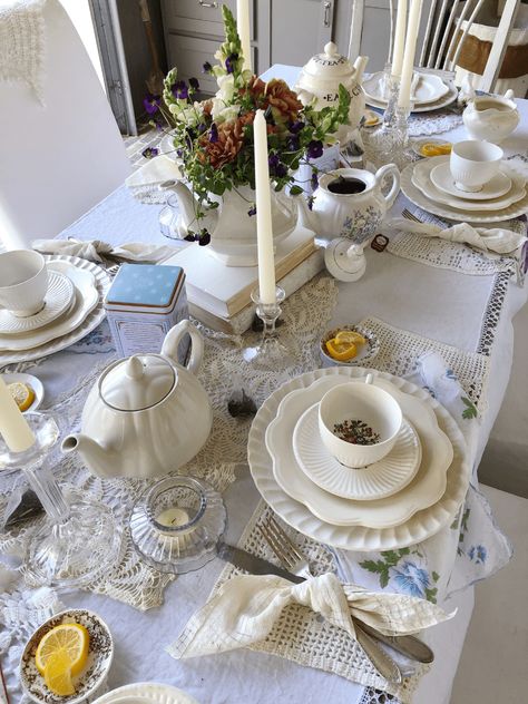 I had so much fun creating this beautiful tea party brunch for girlfriends! I love hosting parties and creating tablescapes and this one was definitely a fun one! Using some of my great grandmothers vintage handkerchiefs and a some sweet teacups and saucers made this event beautiful and elegant. Doilies placed on the back of chairs and vintage hankies used for placemats was a fun and unusual twist on the tablescape. I hope you enjoying seeing how to host a tea party brunch! Afternoon Tea Party Decorations, Tea Party Tablescape, Tea Party Brunch, Host A Tea Party, Tea Party Table Settings, Tea Table Settings, Tea Time Table, Afternoon Tea Tables, English Tea Party