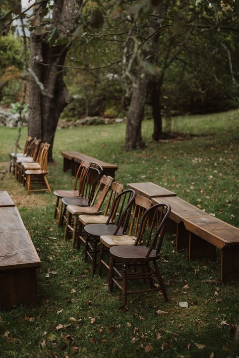 Wedding Different Chairs, Farm Wedding Seating, Wood Bench Wedding, Outdoor Cottage Wedding, Outside Wedding Ceremony Arch, Tiny Outdoor Wedding, Wedding In A Pasture, Mismatched Dining Chairs Wedding, September Farm Wedding