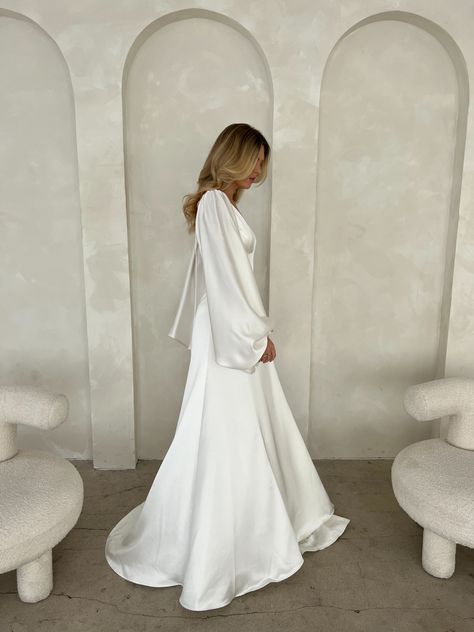 Wedding Dress Sleeves Satin, White Satin Modest Dress, Long Sleeve Flowy Wedding Dress Simple, Long Sleeved Backless Wedding Dress, Long Sleeved Silk Wedding Dress, White Bishop Sleeve Dress, Super Flowy Dress, Slouchy Wedding Dress, Wedding Dress Long Flowy Sleeves