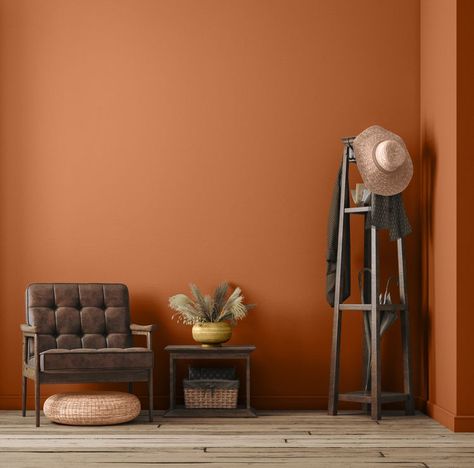 Light Orange Paint Walls, Orange Red Paint Colors, Burnt Orange Behr Paint Colors, Orange Home Decor Living Room, Orange Paint Bathroom, Neutral Orange Paint Colors, Orange Accent Wall Office, Tangerine Paint Color, Painting Walls Different Colors