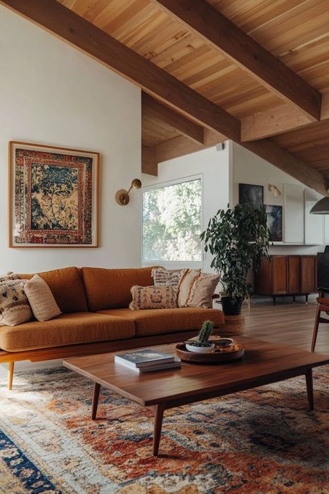 ♥ Are you dreaming of a cozy and stylish living room with a touch of 70s interior design? Step into this Mid Century Modern living room, a blend of boho and modern aesthetics. From the earthy tones to the accent walls, this space screams "cozy living room goals". ✨🌿 #mcmLivingRoom #70sInteriorDesign #CozyLivingRoom #NeutralLivingRoom #LivingRoomInspiration Mid Century Indian Living Room, Boho Great Room, Midcentury Ranch Living Room, Farmhouse Colorful Living Room, Natural Modern Farmhouse Living Room, 70s Southwestern Interior, Mid Century Modern Living Room Cream Couch, Living Room Designs 70s, Modern Contemporary Aesthetic