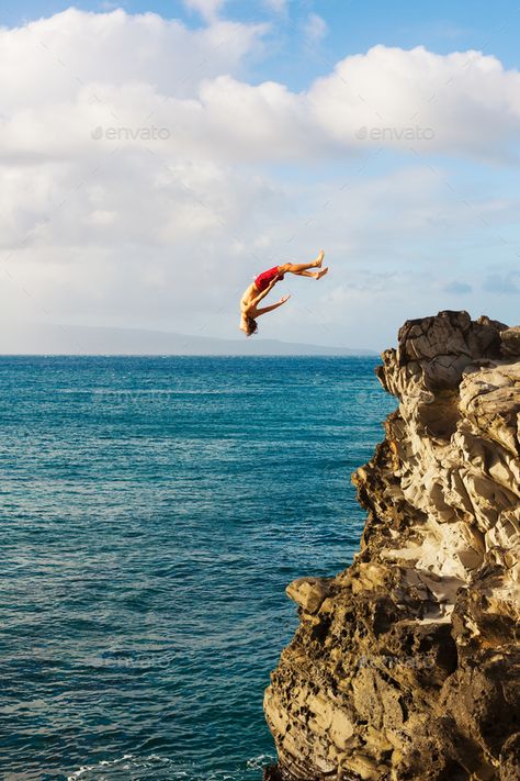 Cliff Jumping by EpicStockMedia. Cliff Jumping into the Ocean at Sunset, Summer Fun Lifestyle#EpicStockMedia, #Ocean, #Cliff, #Jumping Cliff Diving Aesthetic, Cliff Jumping Aesthetic, Adrenaline Aesthetic, Jumping Off Cliff, Jump Into Water, Jumping Into Water, Dove Real Beauty, Cliff Jump, Ocean At Sunset