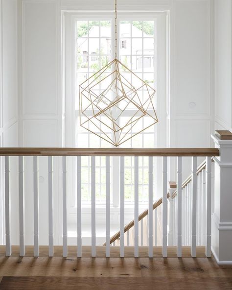 Nothing better than a statement light fixture to light up ✨ a beautiful stairway . . . . . . . . 📷 b Entry Chandelier Entryway, Hamptons Staircase, Two Story Foyer Lighting, Gallery Stairs, Stairway Chandelier, Wood Banister, Stairwell Chandelier, Staircase Lighting Ideas, Entry Chandelier