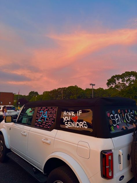 #senior #cars #bronco #painting Seniors Car Paint, Senior Curb Painting, Senior Car Inspo 2025, Senior Car Chalk Ideas, Senior Car Decorating Ideas 2020 Parade, Senior Year Car Paint Ideas 2025, Car Painting Senior Year, Senior Sunset Ideas High School, Car Decorating Senior Year