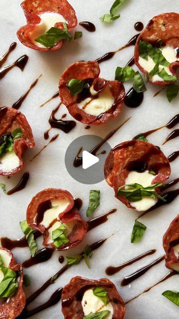 Corrina Cafarelli | The Charcuterie Queen on Instagram: "Baked Salami Cups✨  What you will need:  - Mini Cupcake Pan - Shot Glass  - Genoa Salami - Fresh Mozzarella  - Balsamic Glaze - Fresh Basil   Directions: Preheating your oven to 400°F and then add your salami into each space on your mini cupcake pan. I like to use a shot glass to press down the salami, it makes it a little bit easier.  Once you have all your salami in the pan place into the oven for about 10 minutes, until the salami gets super crispy.  While the salami is baking, this is where you will chop up your fresh mozzarella into smaller bite-size pieces. Take out the salami and then add in all of your small fresh mozzarella pieces and then bake together for another 5 to 7 minutes. Once they are all done, take them out and pu Salami Cups, Baked Salami, Mozzarella Balsamic, Mini Cupcake Pan, Genoa Salami, Cupcake Pans, Mini Cupcake, Cupcake Pan, Balsamic Glaze