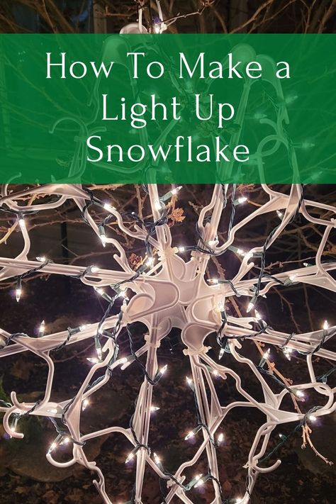 Easily Make a Lighted Snowflake Using Dollar Tree Hangers - The Daily DIY Snowflake Projector Lights, Large Snowflakes Diy How To Make, Hanger Snowflakes Diy, Diy Christmas Light Tree Outdoor, Diy Light Up Snowflakes, Hanger Snowflake Diy With Lights, Plastic Hanger Snowflake Diy, Large Snowflakes Diy, Hanger Snowflake Diy