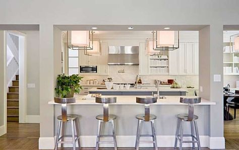 The home's kitchen includes a marble island and breakfast bar. Photo: Scott Hargis Photography Breakfast Bar Window, Kitchen Columns, Bar Window, Farmhouse Kitchen Island, Small Space Kitchen, Open Concept Kitchen, Modern Farmhouse Kitchens, Kitchen Diner, Kitchen Redo