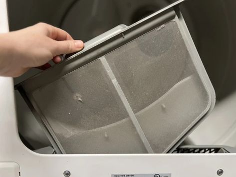 How to Clean a Lint Trap - Men's Journal | Home Living Handbook How To Clean Lint Trap In Dryer, How To Clean Dryer Lint Trap, Dryer Lint Trap, Dryer Duct, Remove Lint, Men's Journal, Lint Brush, Dryer Vent, Clothes Dryer